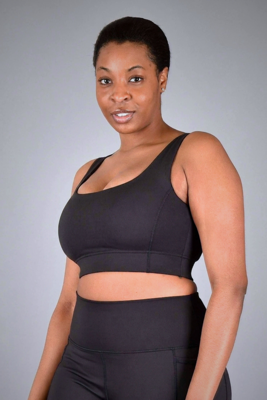 Wear Love More black Brigitte medium support square-neck sports bra  in recycled core compression fabric.