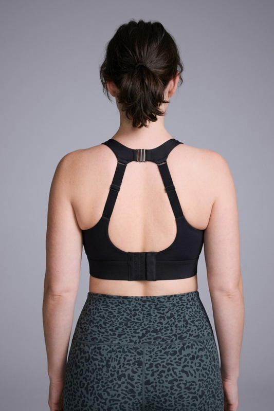 Wear Love More black Sabina high support sports bra with back neck closure in recycled core compression fabric.