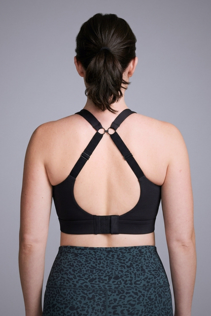 Wear Love More black Veda high support v-neck sports bra with back j-hook racer  in recycled core compression fabric.