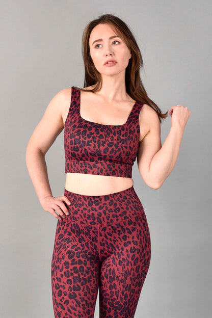 Wear Love More Brigitte Longline Sports Bra in Recycled Luxe Red Velvet Leopard.  Longline bra with square neckline with V-back , wide straps in a red leopard print.  Fabric is made from Recycled Polyester.  Fully lined with removable padding.