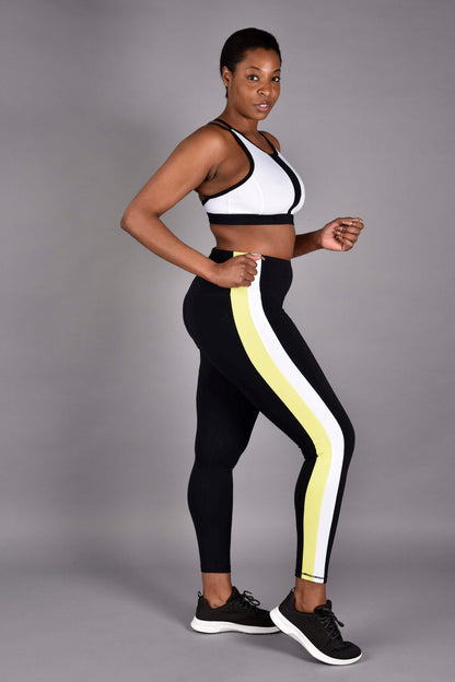 WEAR LOVE MORE Side Stripe Legging . black legging with neon/ white stripe , paired with Stevie High Neck Bra in Black and whtie