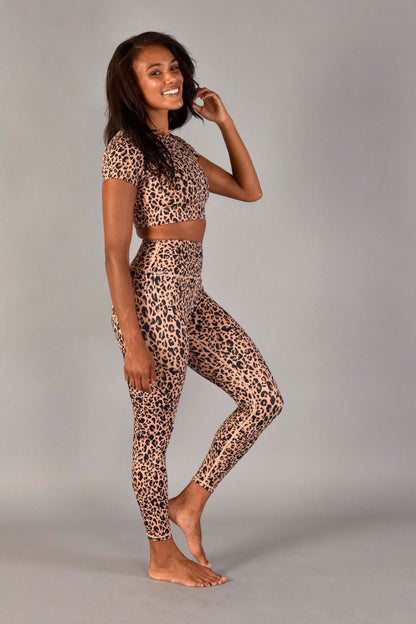 WEAR LOVE MORE Designer Sustainable Activewear. Audrey Reversible Short Sleeve Longline Crop Bra in Nude Leopard.   Recycled Luxury Performance Fabric in Nude Leopard